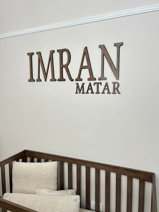 Block layered name sign